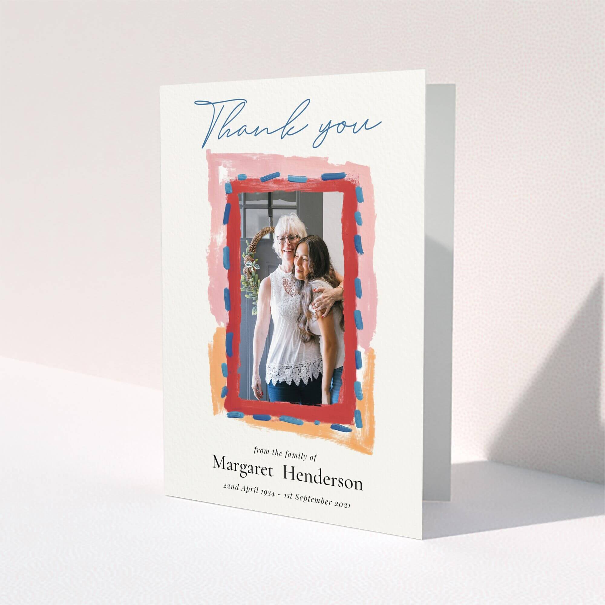 Funeral thank you card design with colourful border and one photo.