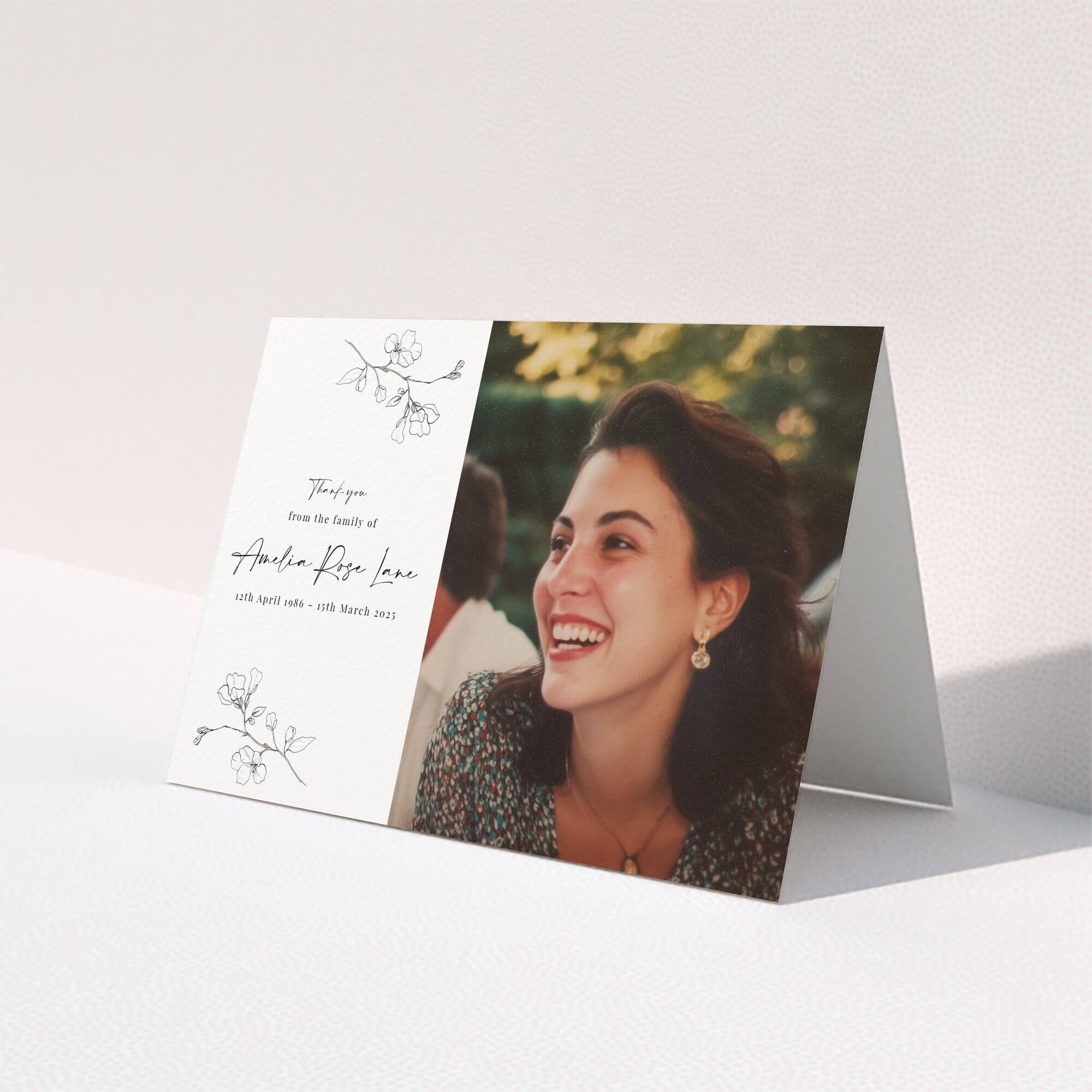 Elegant funeral thank you card design with one photo and floral illustrations.
