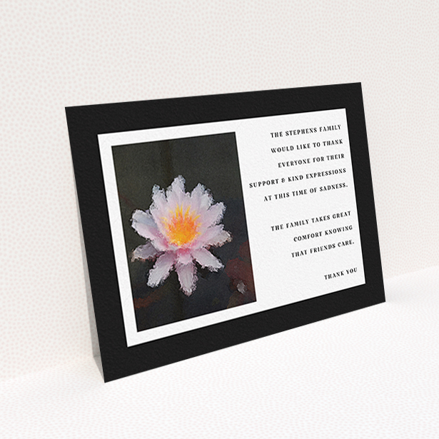 A funeral thank you card design called "A Single Water Lily". It is an A6 card in a landscape orientation. "A Single Water Lily" is available as a flat card, with tones of black and white.