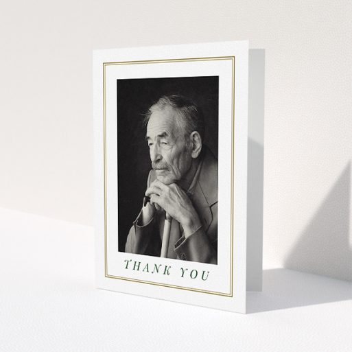 A funeral thank you card template titled 'Classic remembrance'. It is an A5 card in a portrait orientation. It is a photographic funeral thank you card with room for 1 photo. 'Classic remembrance' is available as a folded card, with mainly gold colouring.