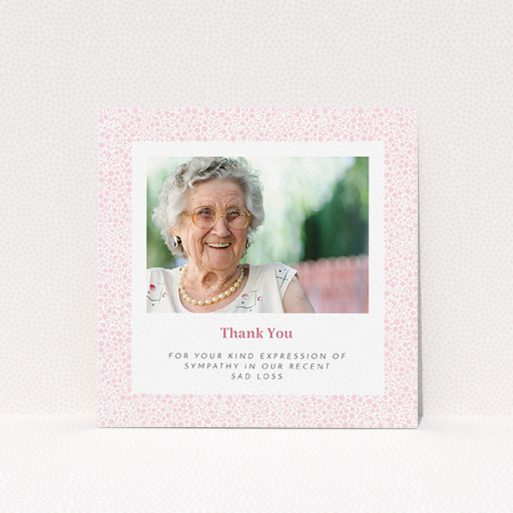 A funeral thank you card design titled "Floral Remembrance". It is a square (148mm x 148mm) card in a square orientation. It is a photographic funeral thank you card with room for 1 photo. "Floral Remembrance" is available as a flat card, with tones of pink and white.
