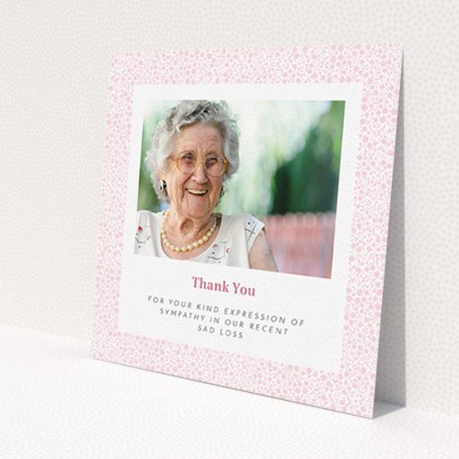 A funeral thank you card design titled 'Floral Remembrance'. It is a square (148mm x 148mm) card in a square orientation. It is a photographic funeral thank you card with room for 1 photo. 'Floral Remembrance' is available as a flat card, with tones of pink and white.