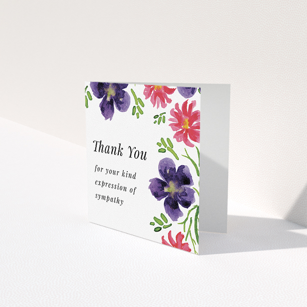 A funeral thank you card design called "Flowers encroaching". It is a square (148mm x 148mm) card in a square orientation. "Flowers encroaching" is available as a folded card, with tones of white and dark purple.