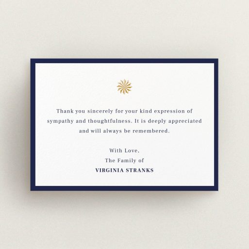 Funeral Thank You Card Design - "Golden sundial" A funeral thank you card named "Golden sundial". It is an A6 card in a landscape orientation. "Golden sundial" is available as a flat card, with tones of navy blue and white.