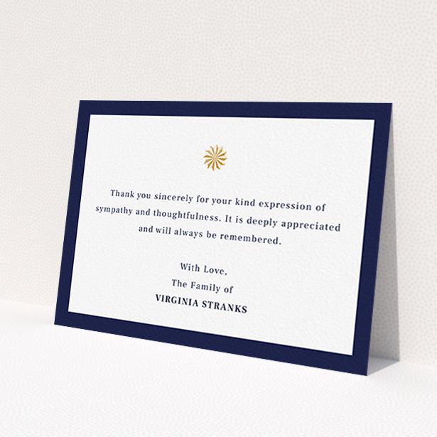 A funeral thank you card named "Golden sundial". It is an A6 card in a landscape orientation. "Golden sundial" is available as a flat card, with tones of navy blue and white.