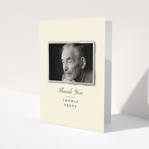 A funeral thank you card design named 'Out of the photo album'. It is an A5 card in a portrait orientation. It is a photographic funeral thank you card with room for 1 photo. 'Out of the photo album' is available as a folded card, with tones of cream and gold.