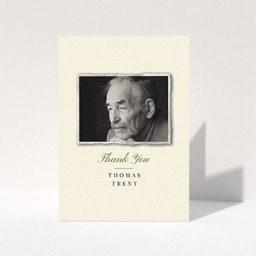 A funeral thank you card design called "Out of the photo album". It is an A6 card in a portrait orientation. It is a photographic funeral thank you card with room for 1 photo. "Out of the photo album" is available as a folded card, with tones of cream and gold.