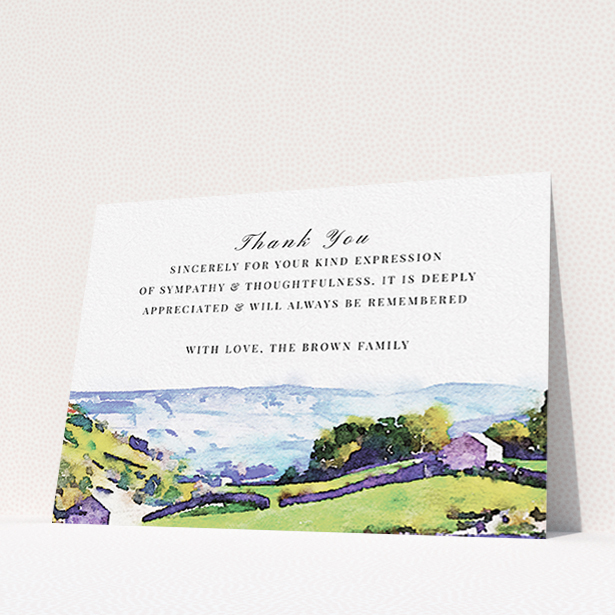 A funeral thank you card design named "Rolling down the valley". It is an A6 card in a landscape orientation. "Rolling down the valley" is available as a flat card, with tones of white, blue and green.