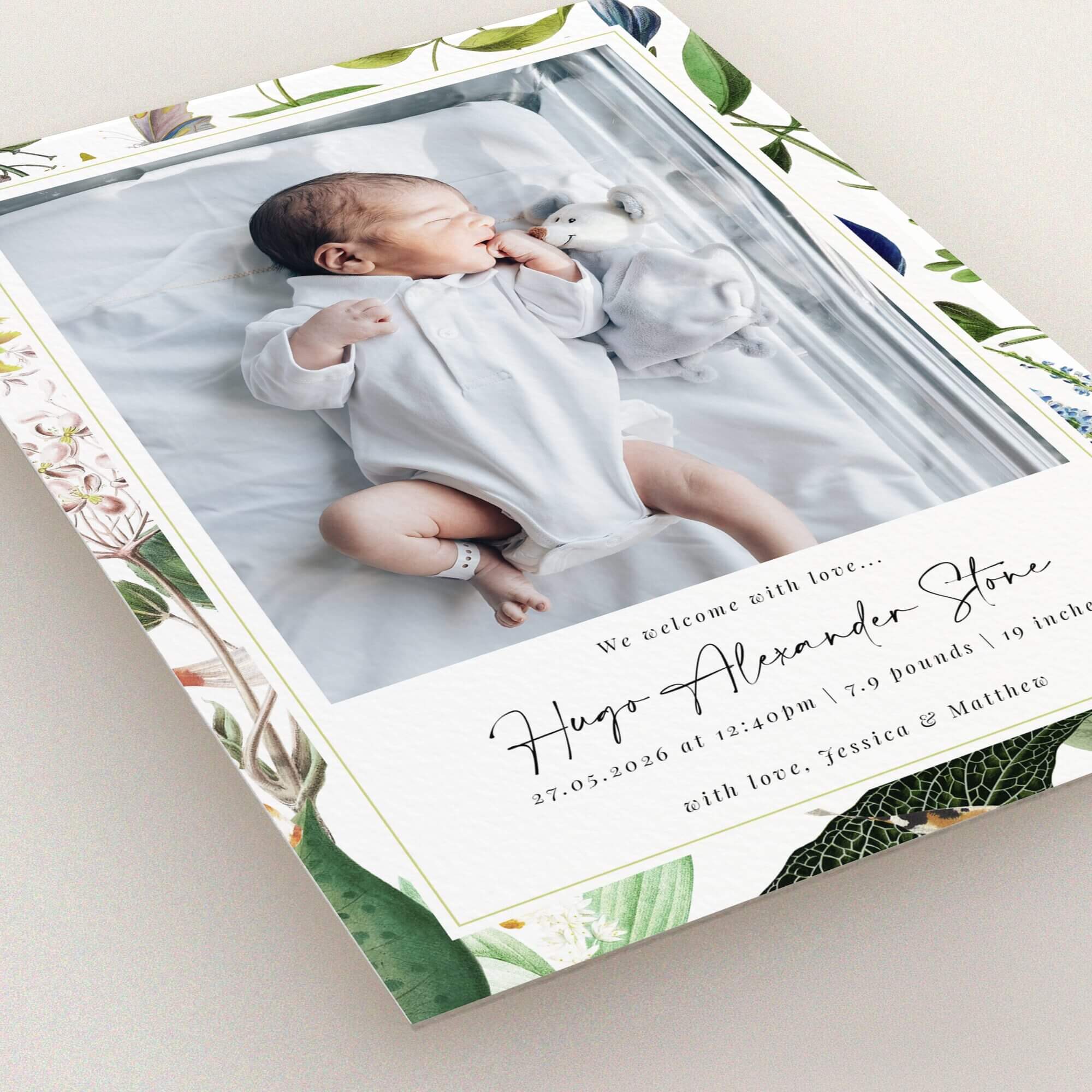 Floral birth announcement card design with one photo of a newborn baby in a white outfit.