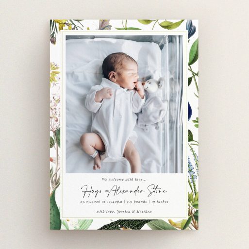 Floral birth announcement card design with one photo of a newborn baby in a white outfit.