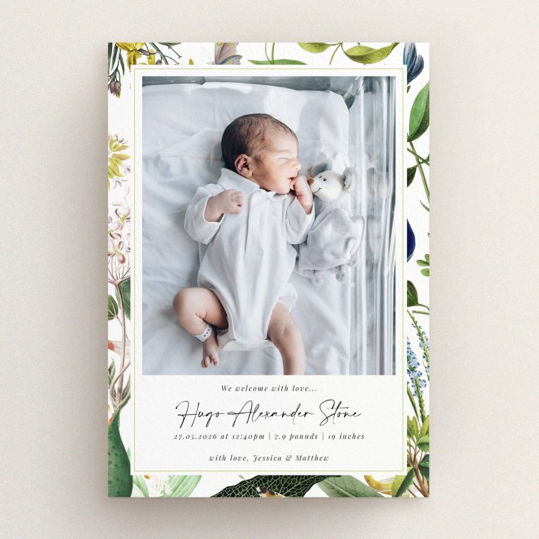 Floral birth announcement card design with one photo of a newborn baby in a white outfit.