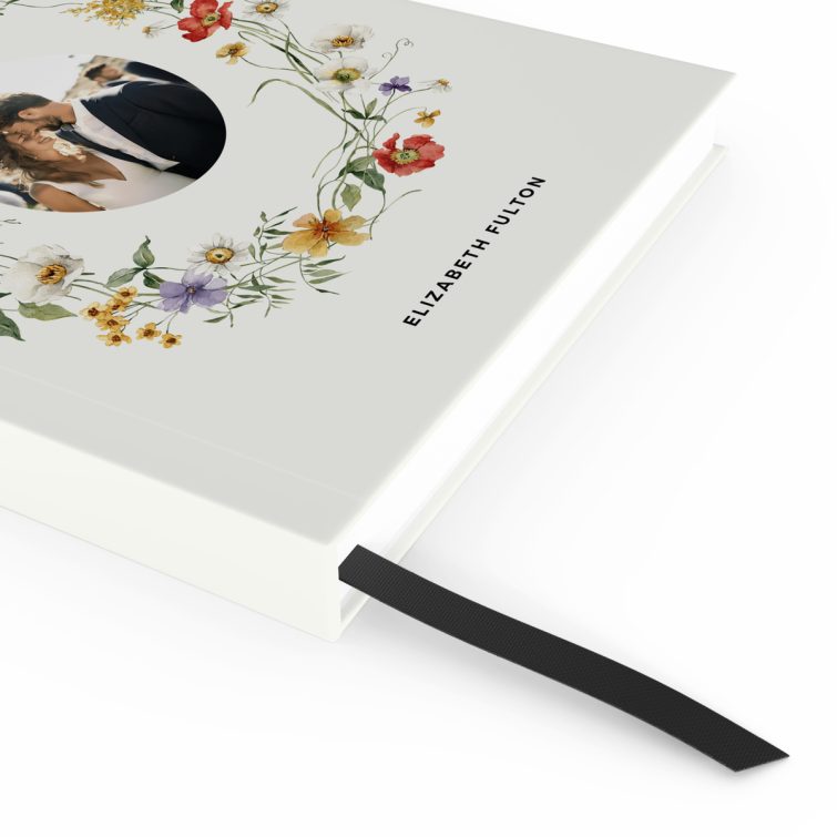 Personalised floral notebook cover design with one wedding photo on the front.