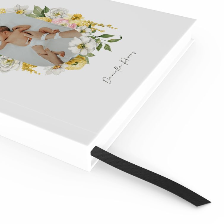 Floral baby-themed notebooks design with one photo on the cover for personalised print products.