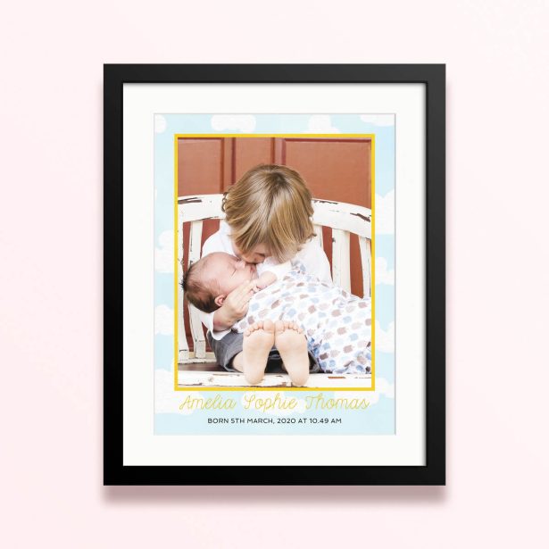 Framed and mounted photo print with one photograph featuring a personalised baby announcement.