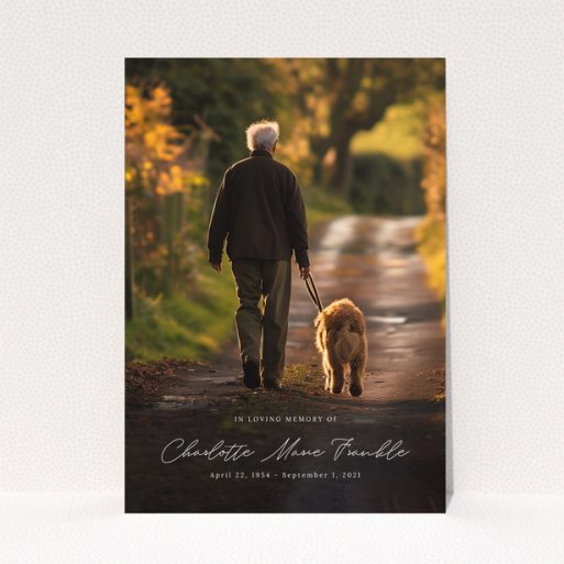 Funeral announcement design with one photo of a person walking a dog on a path