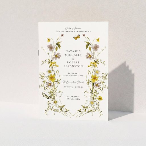 Floral wedding order of service program design with butterflies and two photo placeholders on a cream background.