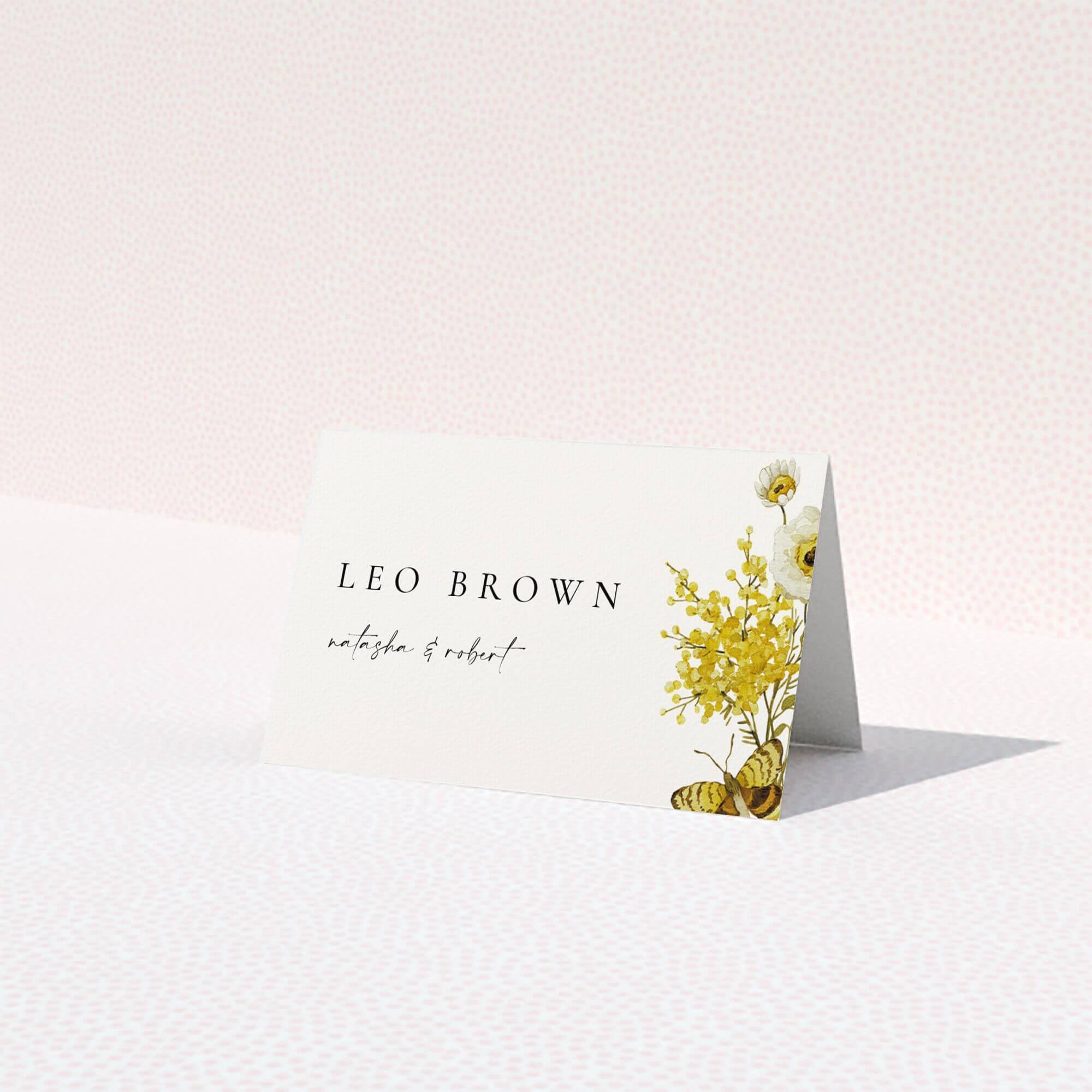 Floral wedding table place card with elegant typography and decorative yellow flowers and butterfly design