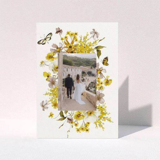 Floral Wedding Gratitude Elegant wedding thank you card design with one central photo surrounded by yellow floral accents.