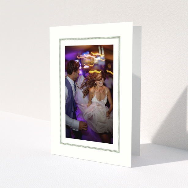 Wedding photo album cover with one photo of a couple dancing.