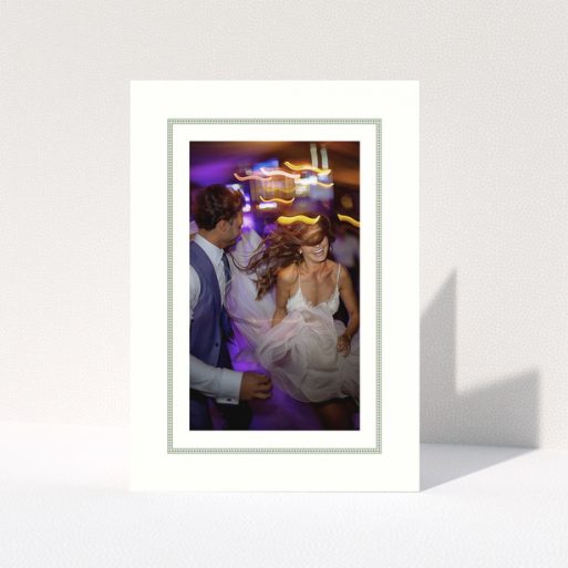 Wedding photo album cover with one photo of a couple dancing.