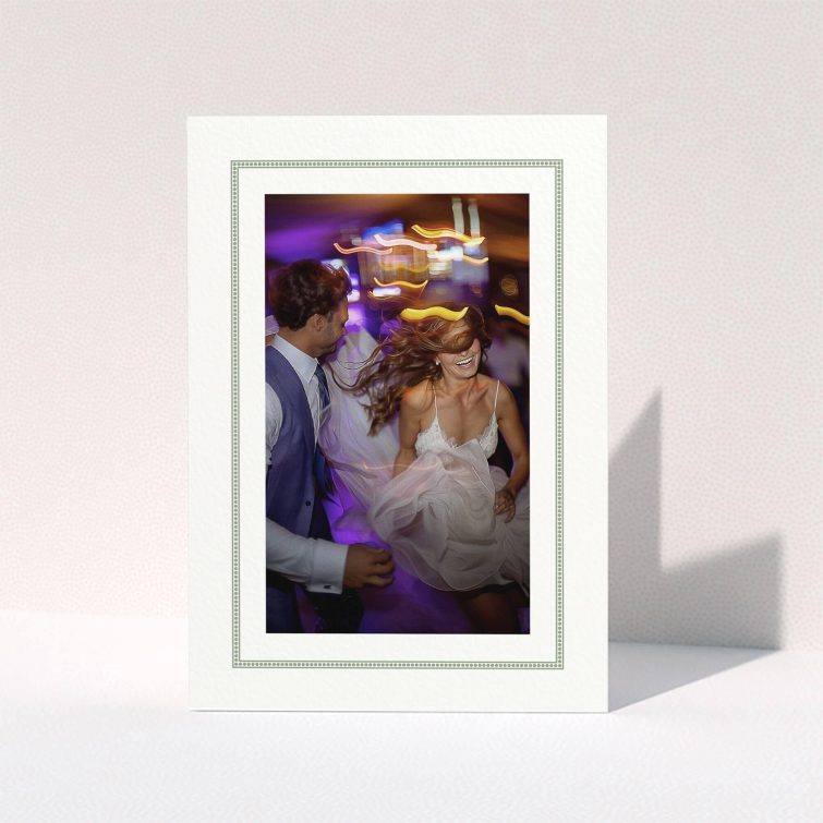 Wedding photo album cover with one photo of a couple dancing.