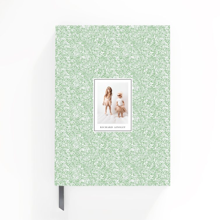 Floral-patterned notebook cover design with one photo on the front.