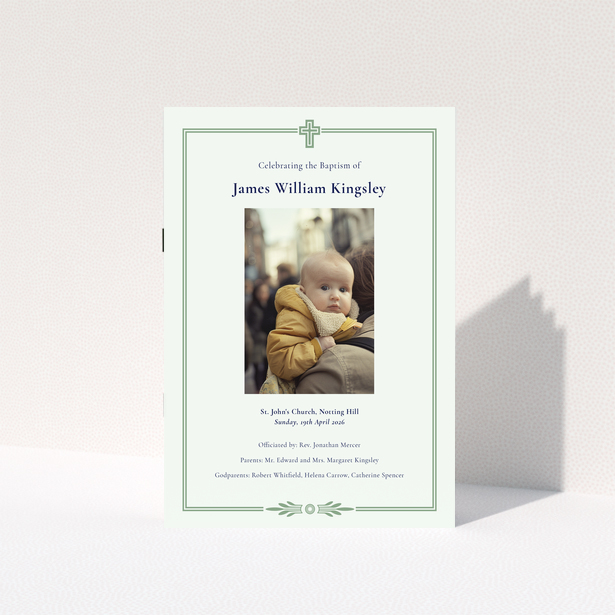 Christening order of service program with green border and single photo of baby.