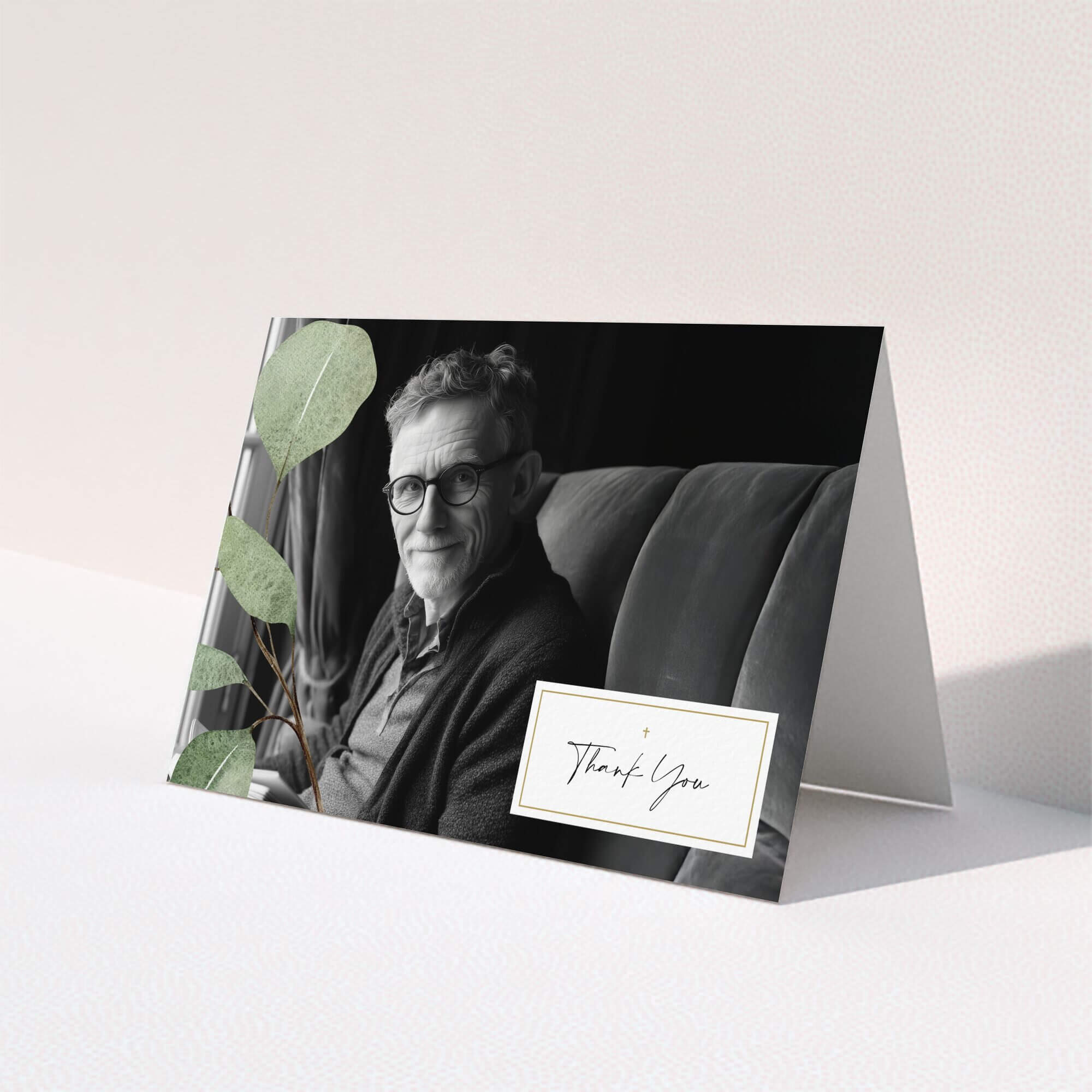 Funeral thank you card design featuring one photo with a botanical element