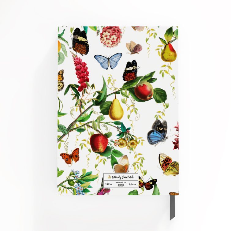 Colourful floral and butterfly design on portrait notebook cover, featuring two photos, ideal for personalised stationery.