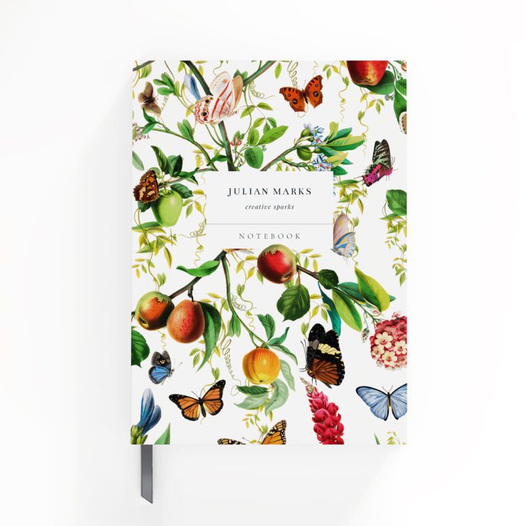 Colourful floral and butterfly design on portrait notebook cover, featuring two photos, ideal for personalised stationery.