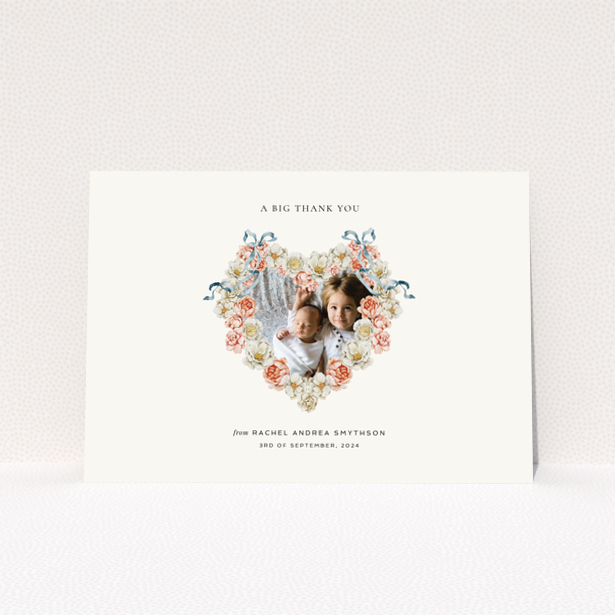 Baby thank you card with floral heart design featuring two photos