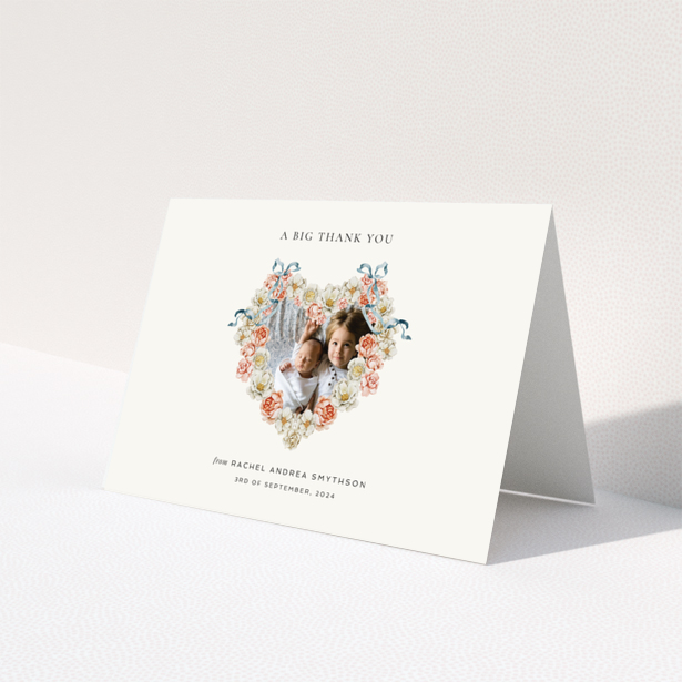 Baby thank you card with floral heart design featuring two photos