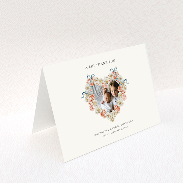 Baby thank you card with floral heart design featuring two photos