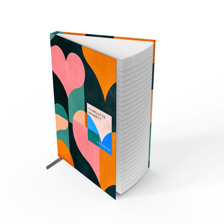 Colourful geometric heart pattern design for notebooks with one placeholder photo on the cover.