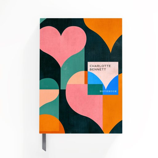 Colourful geometric heart pattern design for notebooks with one placeholder photo on the cover.