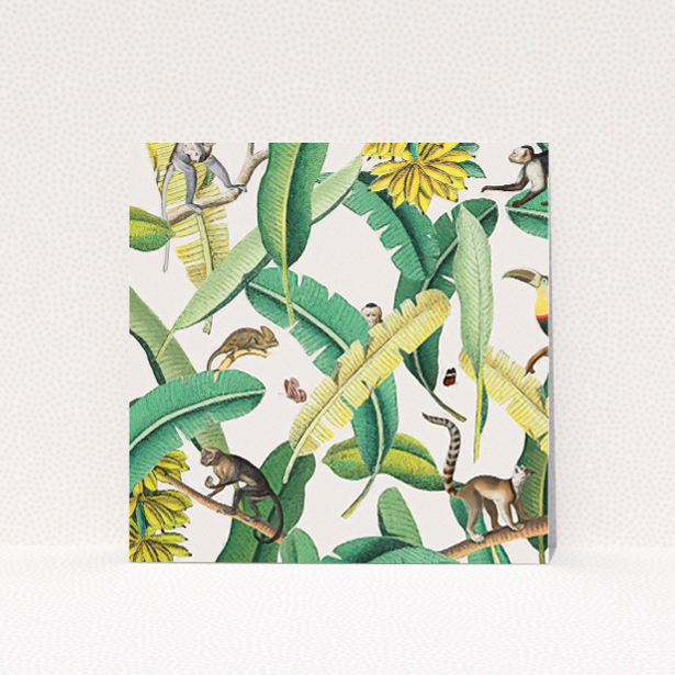 Jungle Oasis wedding save the date card featuring exotic foliage and jungle fauna design. This image shows the front and back sides together