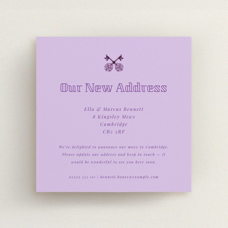 Elegant lavender change of address card design featuring vintage key graphic.