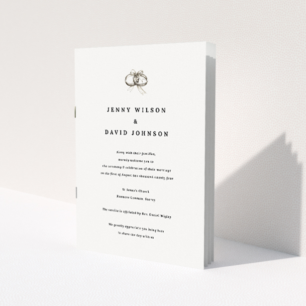 Elegant 'Knotting Hill' Wedding Order of Service A5 booklet design featuring a delicate illustration of interlinked wedding bands, symbolising the union of two lives, with a sophisticated monochromatic colour scheme This is a view of the front