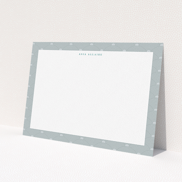 A ladies personalised note card design titled "Discs at dawn". It is an A5 card in a landscape orientation. "Discs at dawn" is available as a flat card, with tones of grey and blue.