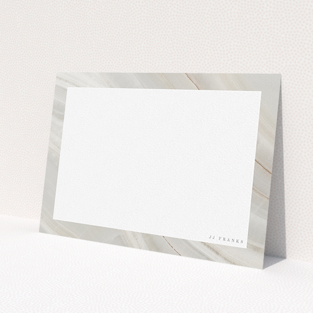 A ladies personalised note card named 'Swells of marble'. It is an A5 card in a landscape orientation. 'Swells of marble' is available as a flat card, with tones of grey and white.