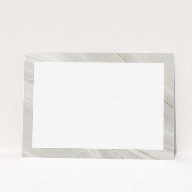 A ladies personalised note card named "Swells of marble". It is an A5 card in a landscape orientation. "Swells of marble" is available as a flat card, with tones of grey and white.