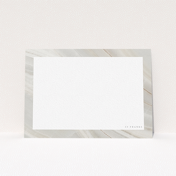A ladies personalised note card named "Swells of marble". It is an A6 card in a landscape orientation. "Swells of marble" is available as a flat card, with tones of grey and white.