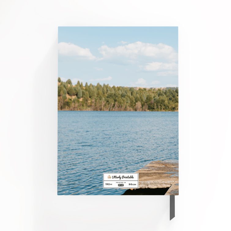 Personalised notebook cover design with photo of four people jumping into a lake, ideal for gifts and photo printing.