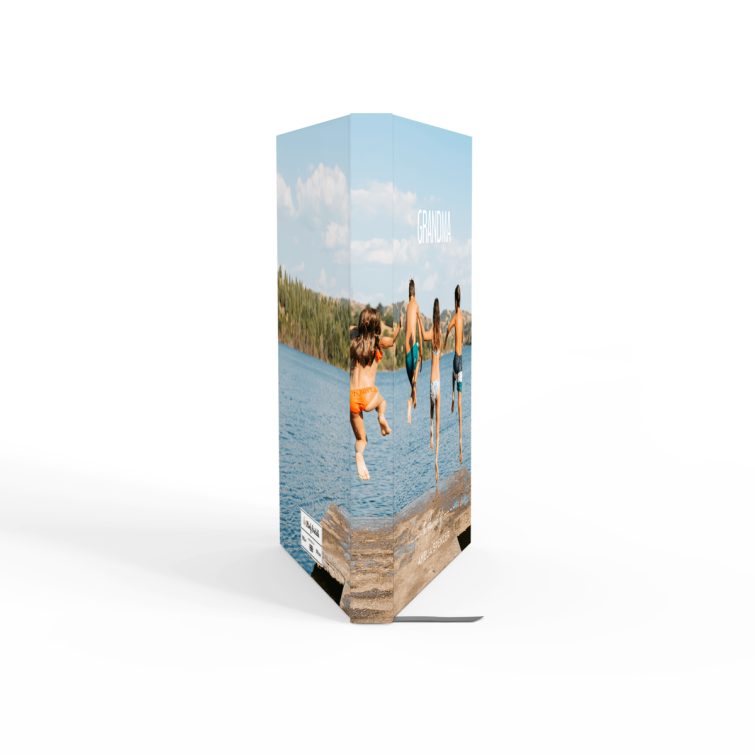 Personalised notebook cover design with photo of four people jumping into a lake, ideal for gifts and photo printing.