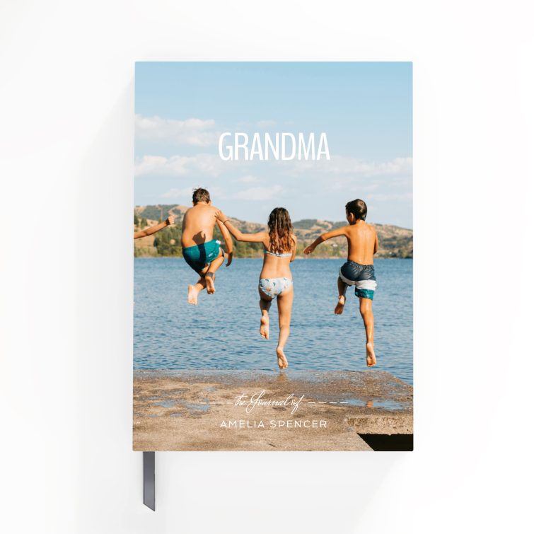 Personalised notebook cover design with photo of four people jumping into a lake, ideal for gifts and photo printing.