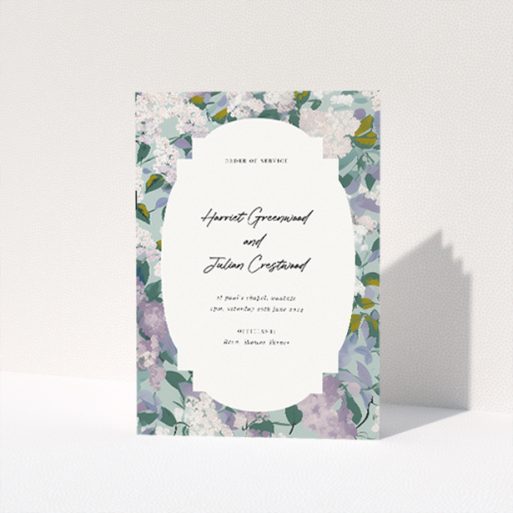 "Lilac Blossom wedding order of service booklet featuring graceful array of lilac and greenery, ideal for refined ceremonies with a touch of spring's tranquillity.". This is a view of the front
