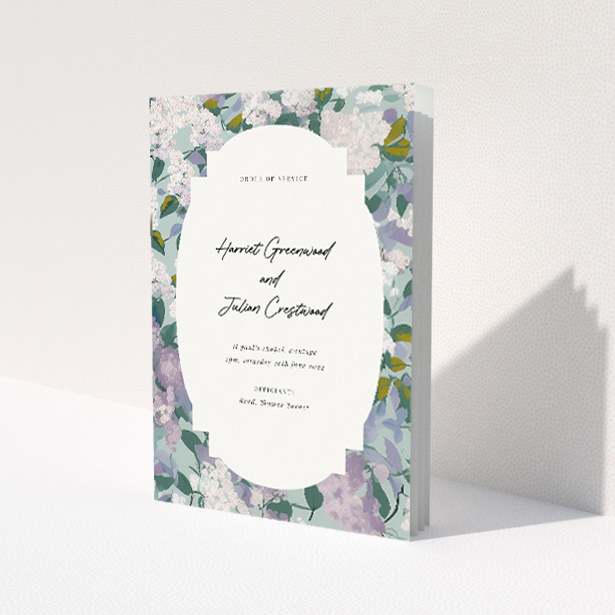 'Lilac Blossom wedding order of service booklet featuring graceful array of lilac and greenery, ideal for refined ceremonies with a touch of spring's tranquillity.'. This is a view of the front
