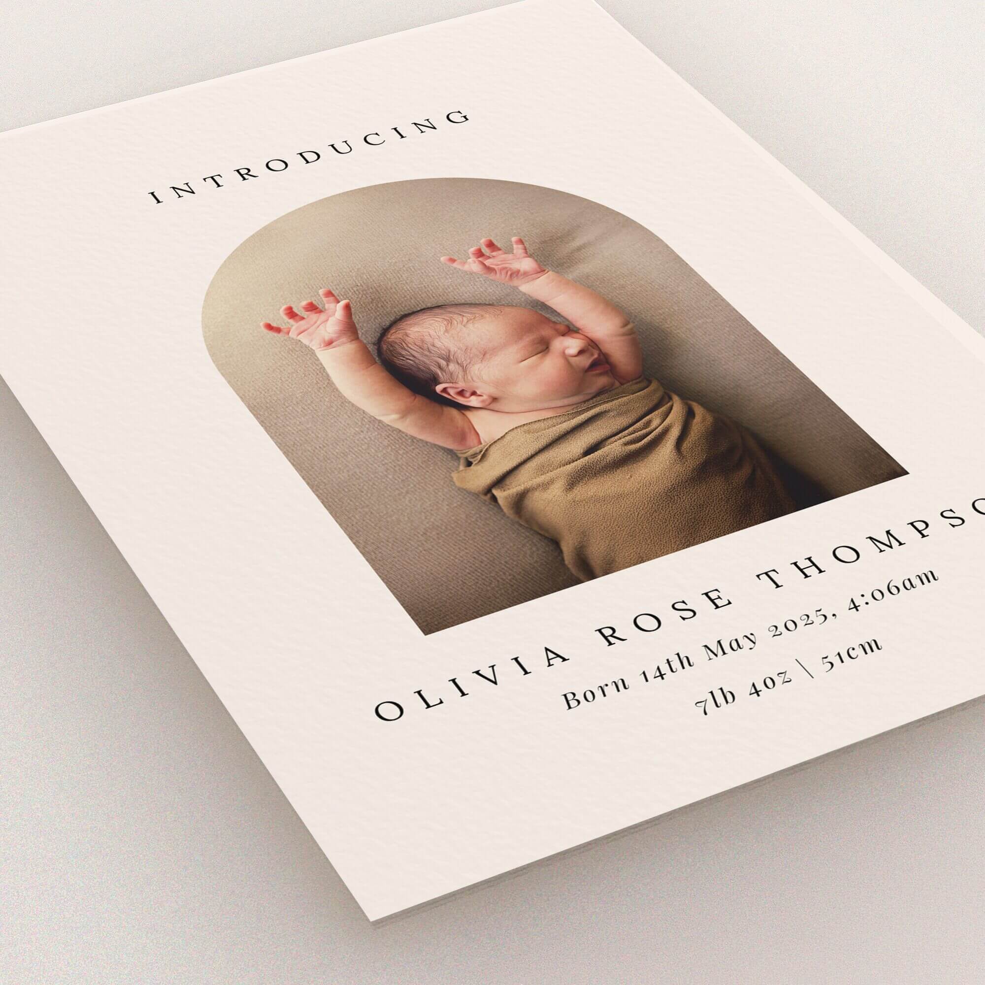 Simple and elegant birth announcement card design featuring one photo.