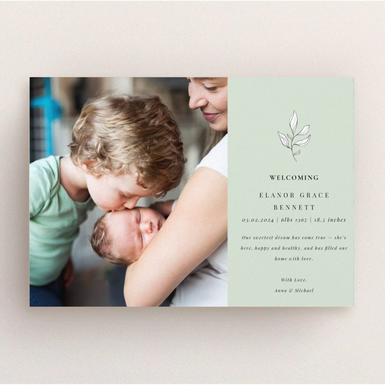 Birth announcement card with one photo featuring family and welcoming text design.