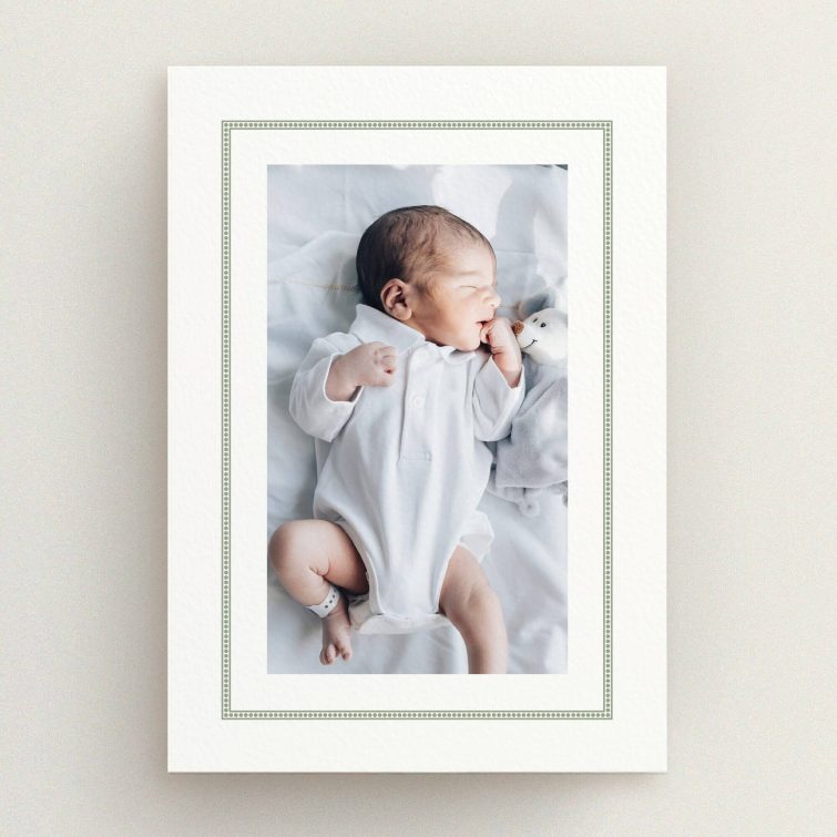Birth announcement card design featuring one photo of a baby in white attire.